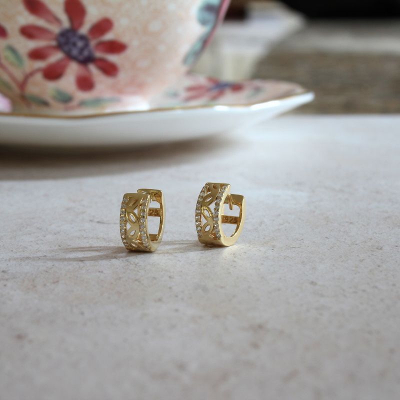 gold on silver openwork huggie earrings with cz edges | Carathea