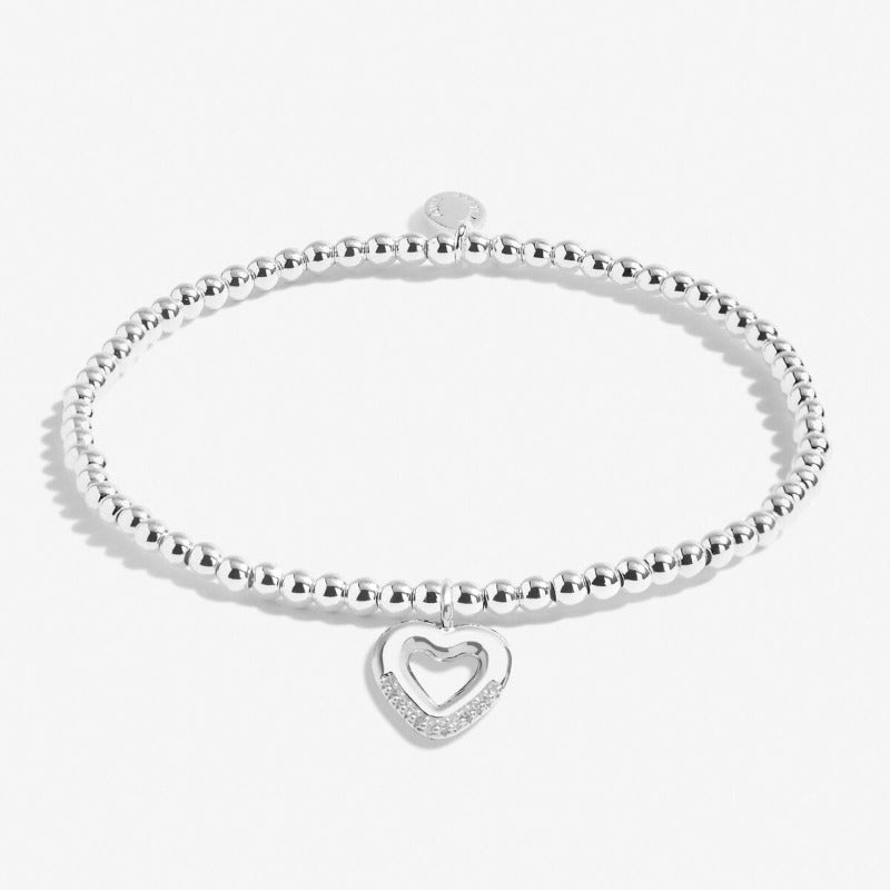 beaded bracelet with heart on Happy First Mother's Day card - Carathea