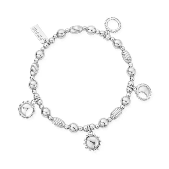silver beaded bracelet with four moon charms in different phases - Carathea 