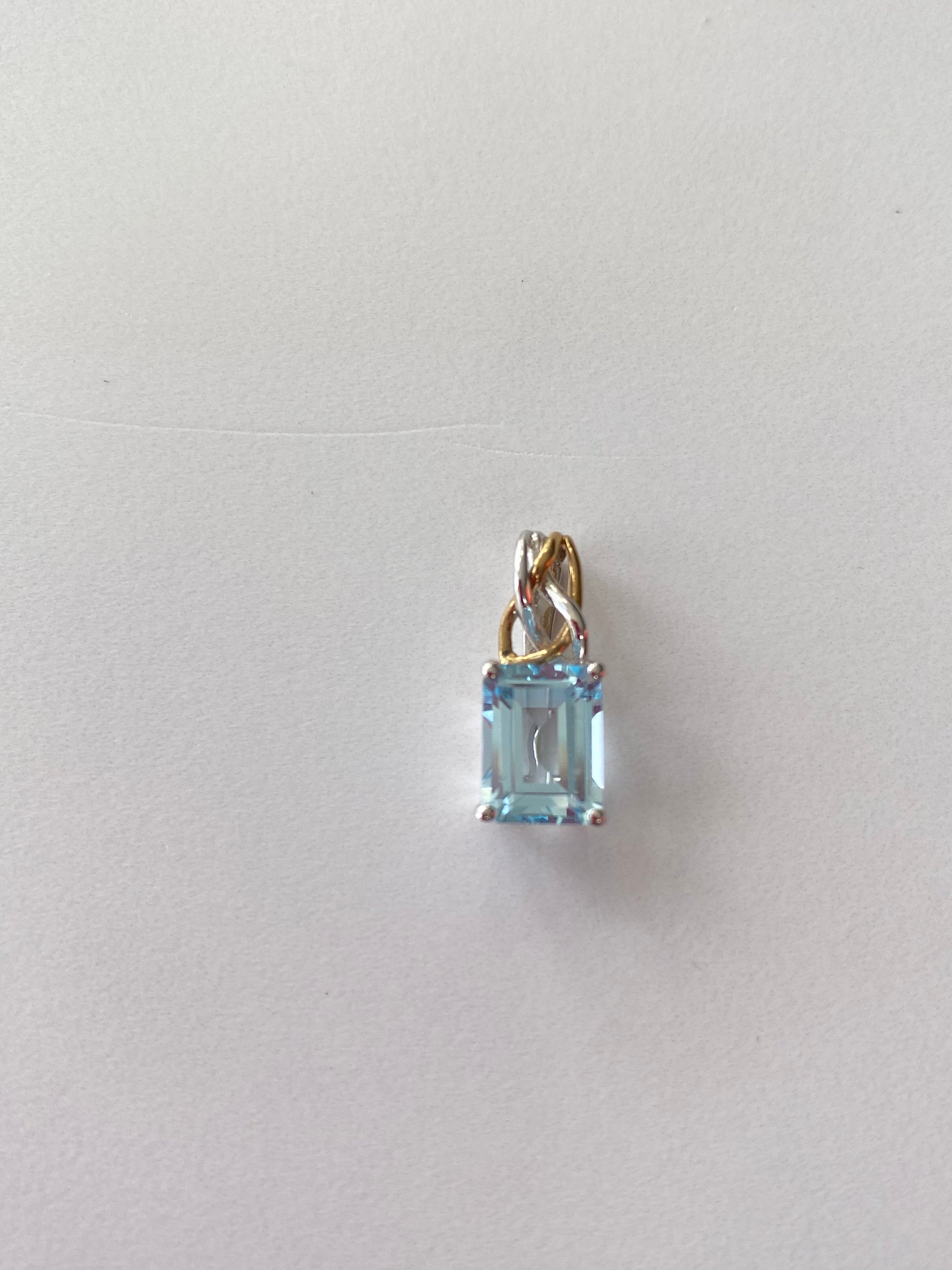 White and Yellow Gold Pendant with Baguette Cut Blue Topaz
