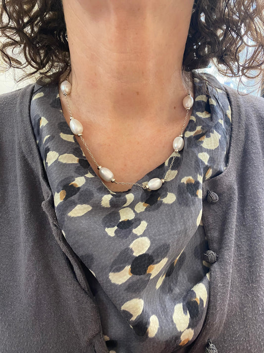 model wearing pearl and silver style Mary Berry necklace 