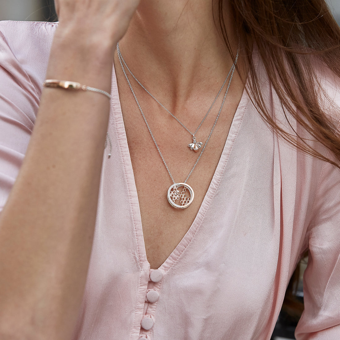 model with bumble bee jewellery necklace