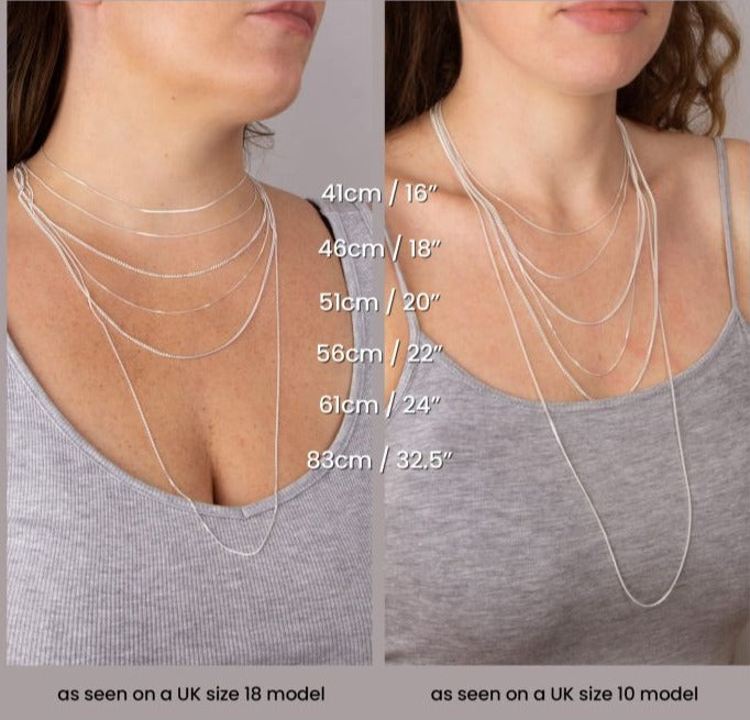 model wearing chains of different lengths - Carathea