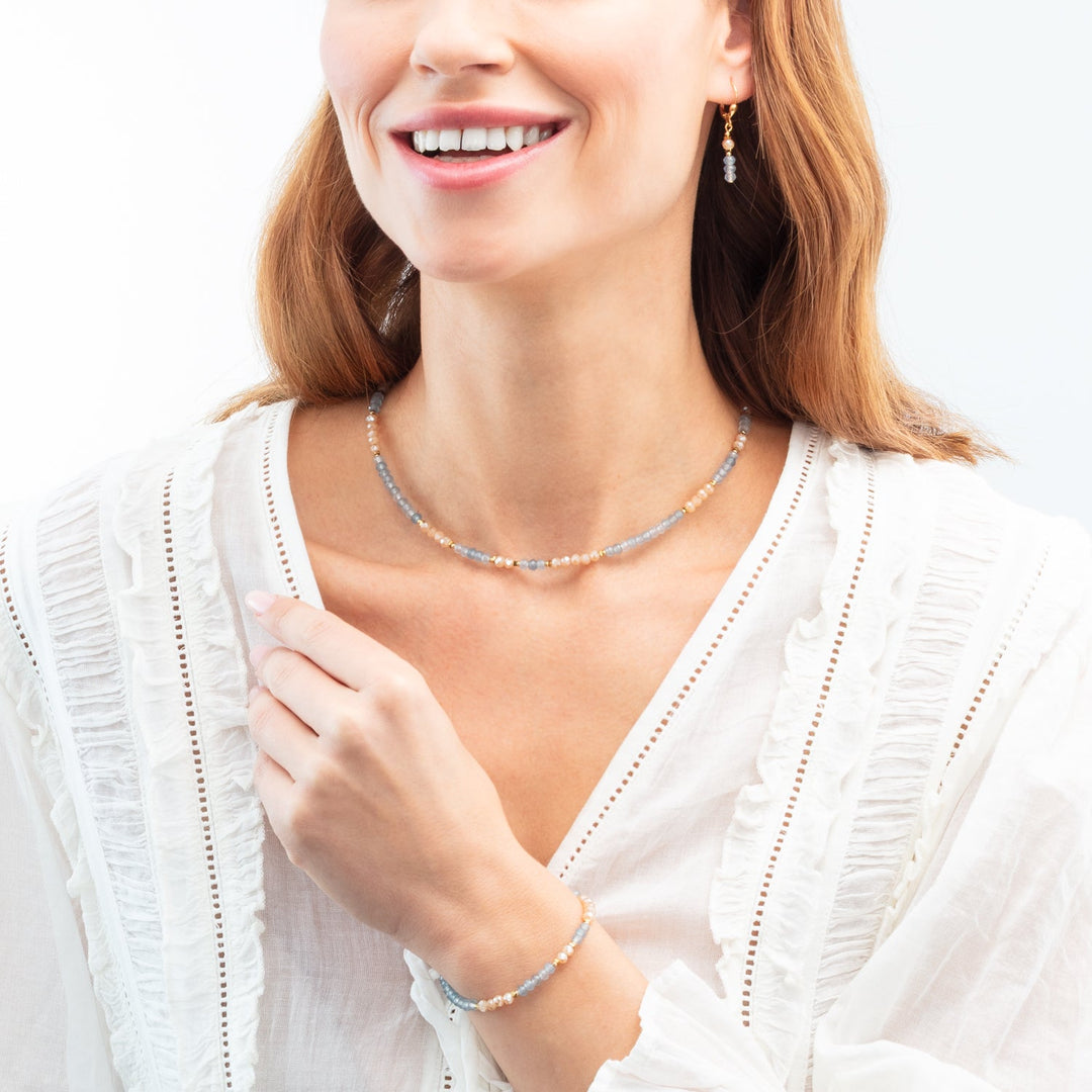 Faceted jade in blue and apricot highlight this beaded necklace - Carathea & Jools