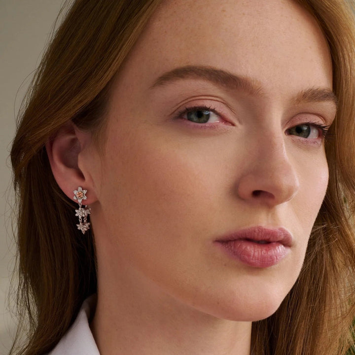 Clogau silver and rose gold daffodil drop earrings - Carathea jewellers