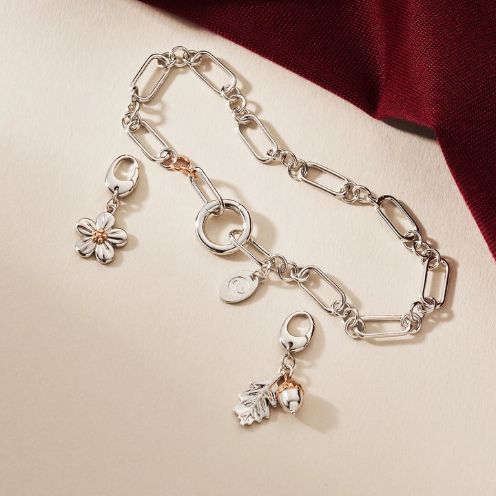 silver & rose gold oak leaf and forget-me-not charm on charm bracelet - Carathea & Jools