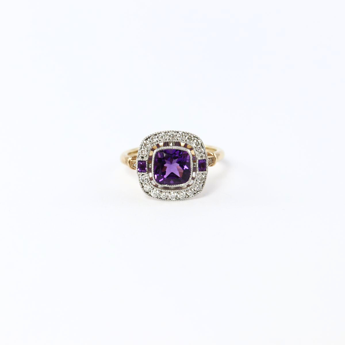 gold ring with cushion cut amethyst and diamonds - Carathea jewellers