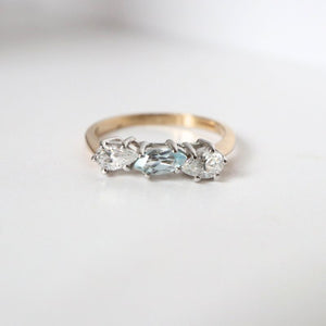 Gold Ring with Blue Topaz and Cubic Zirconia