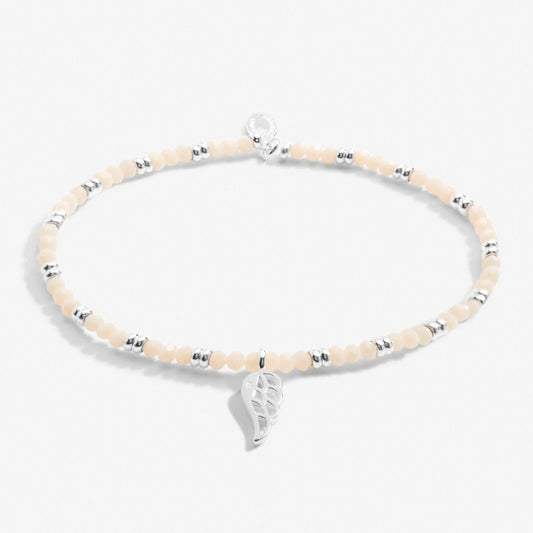 white and silver bead bracelet with wing charm - Carathea