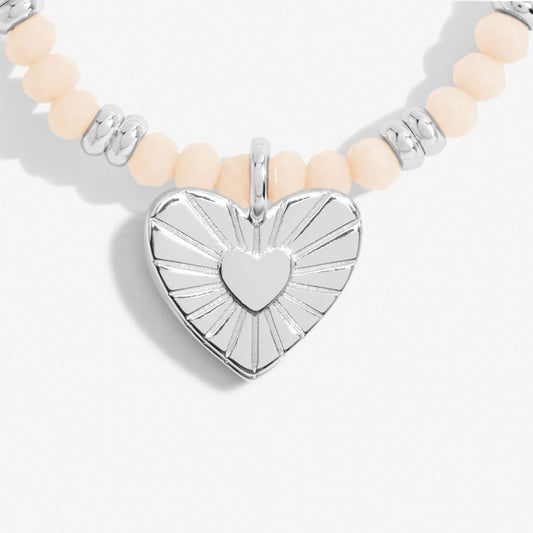 white and silver beaded bracelet with heart charm - Carathea