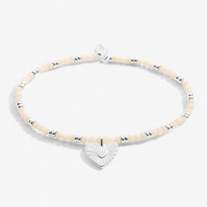 white and silver beaded bracelet with heart charm - Carathea