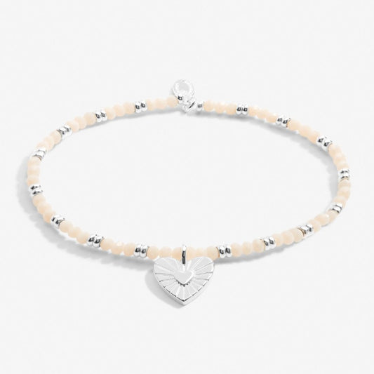 white and silver beaded bracelet with heart charm - Carathea