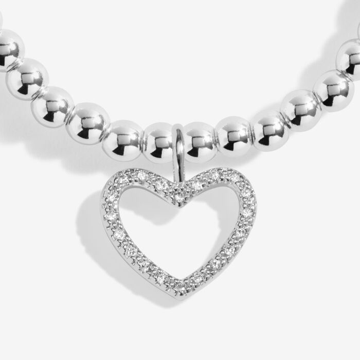 Silver-plated beaded bracelet with a pavé heart charm.