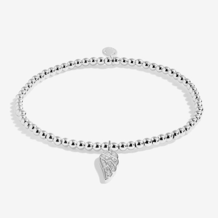 Silver-plated Christmas angel bracelet on a stretch cord.