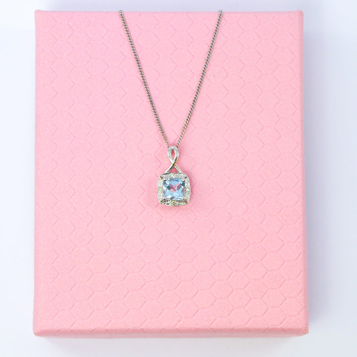 9ct White Gold Aquamarine & Diamond Pendant with Twisted Bale