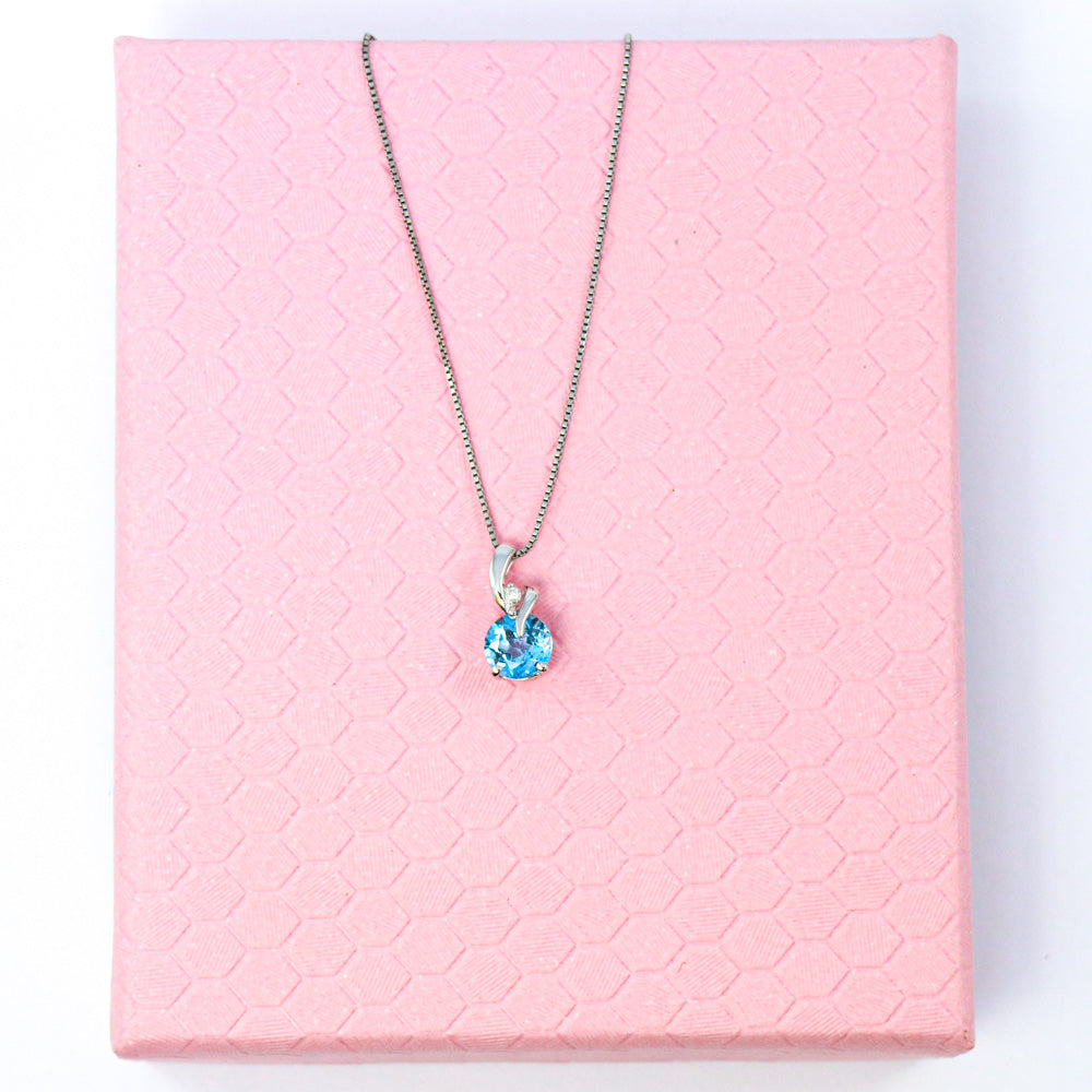 9ct White Gold Blue Topaz & Diamond Twist Pendant