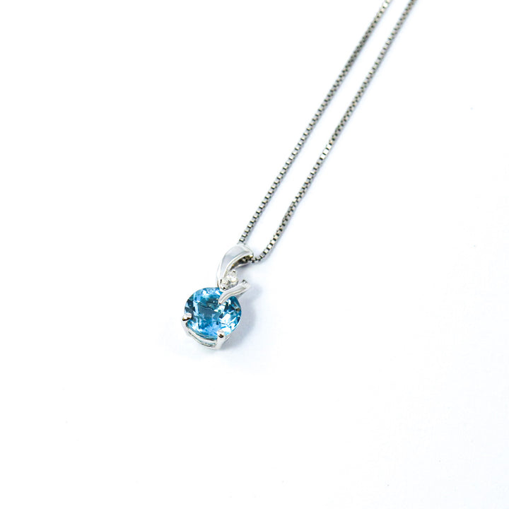 9ct White Gold Blue Topaz & Diamond Twist Pendant