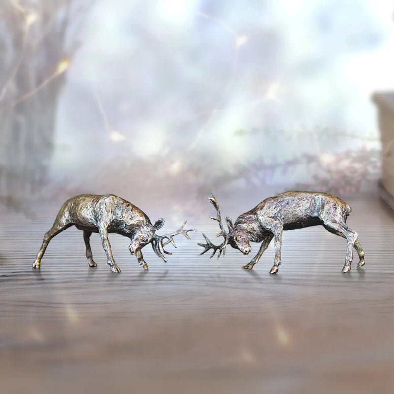 miniature sculpture of rutting stags in solid bronze Carathea jewellers