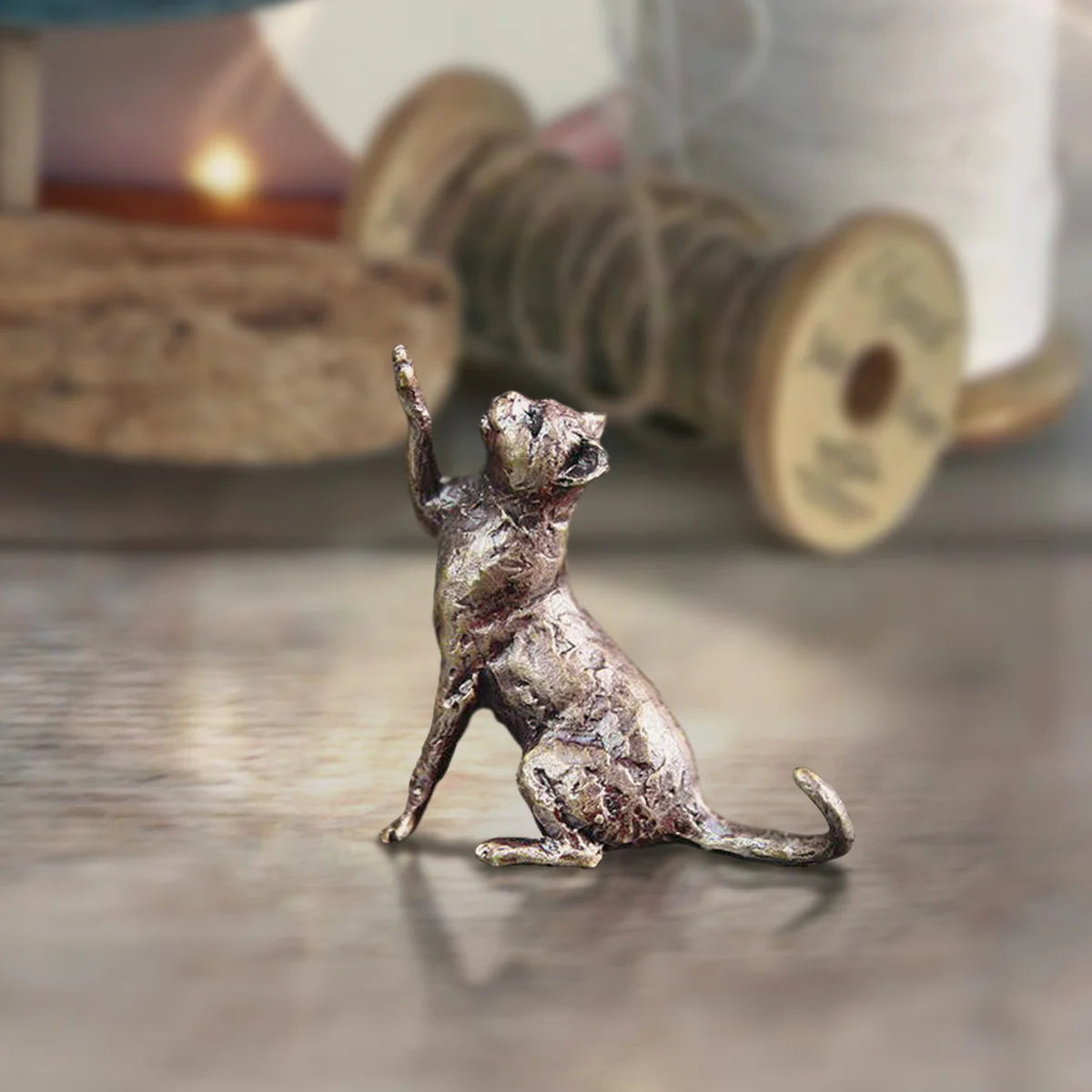 bronze cat sitting sculpture - Carathea jewellers