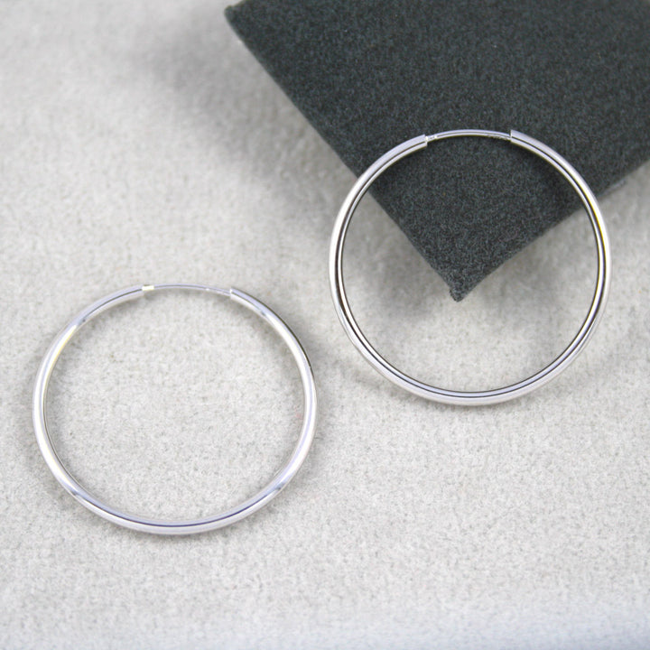 9ct  White Gold 22 mm Sleeper Earrings