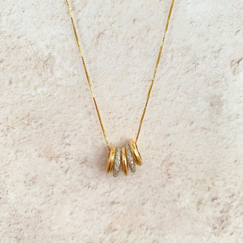Gold and Diamond Necklace with Five rings
