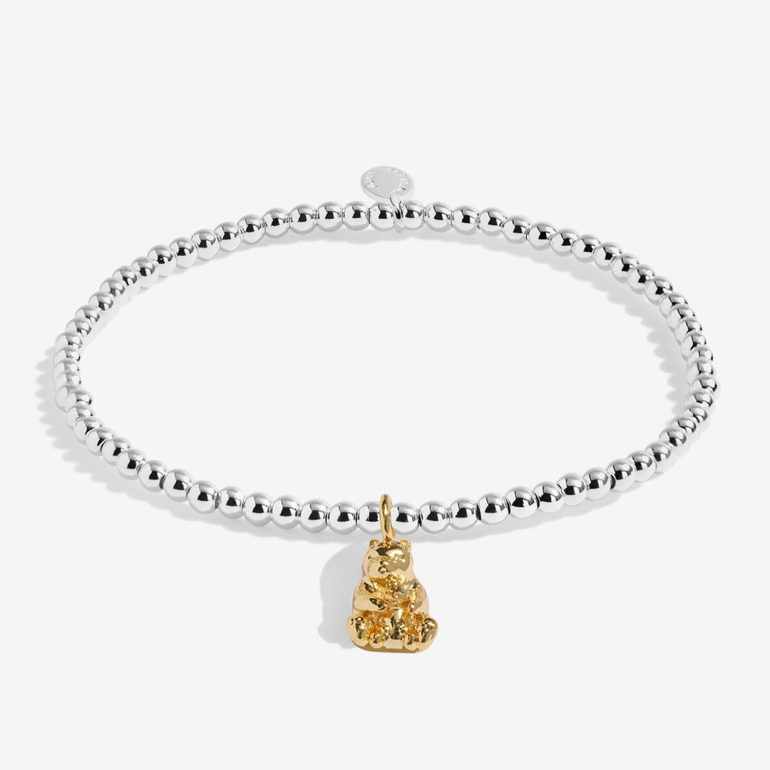 Mama Bear silver and gold bracelet on a gift card.