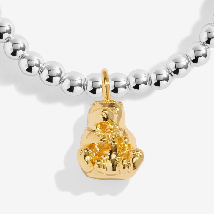 Mama Bear silver and gold bracelet on a gift card.