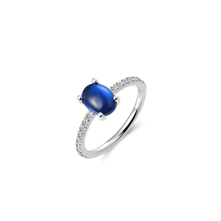 Blue oval stone ring with silver band.