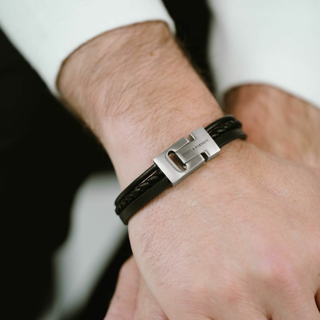 Black leather bracelet with a brushed silver magnetic clasp.