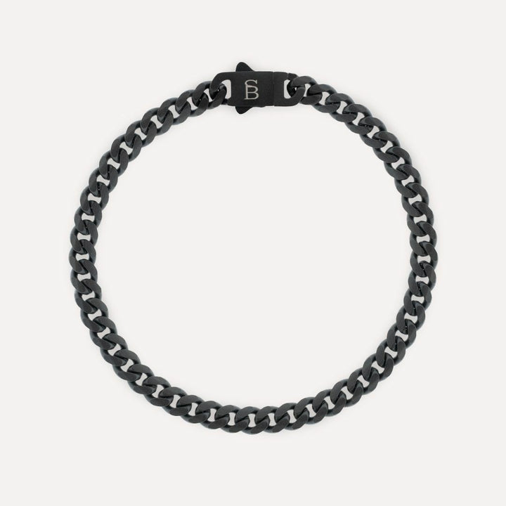 Black lined bracelet.
