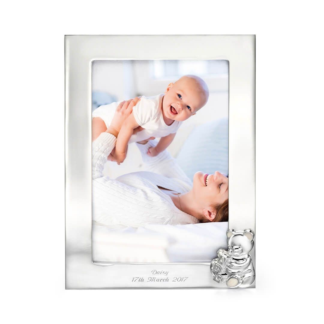 silver plated photo frame with teddy on corner - Carathea jewellers