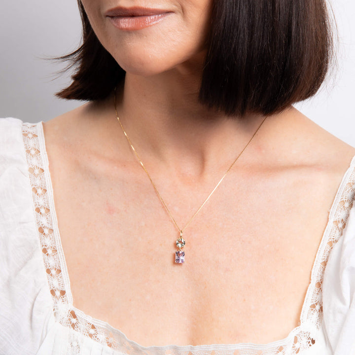 model wearing amethyst and quartz Toi et moi pendant set - Carathea & Jools