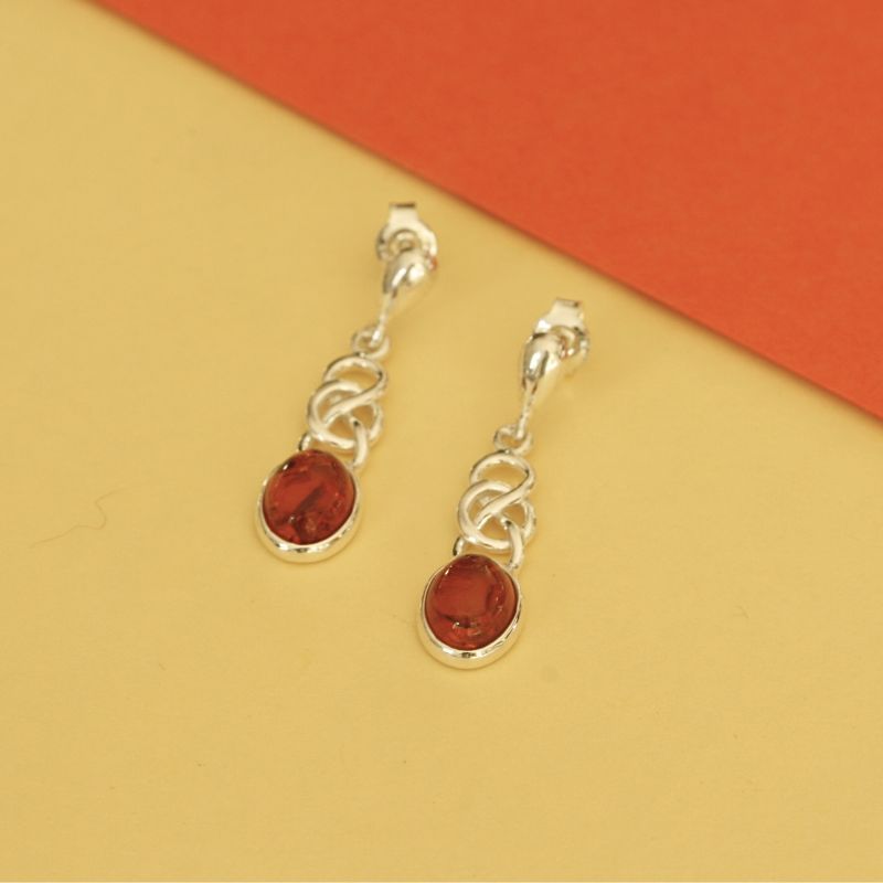 drop earrings with amber oval in Celtic style - Carathea Jewellers
