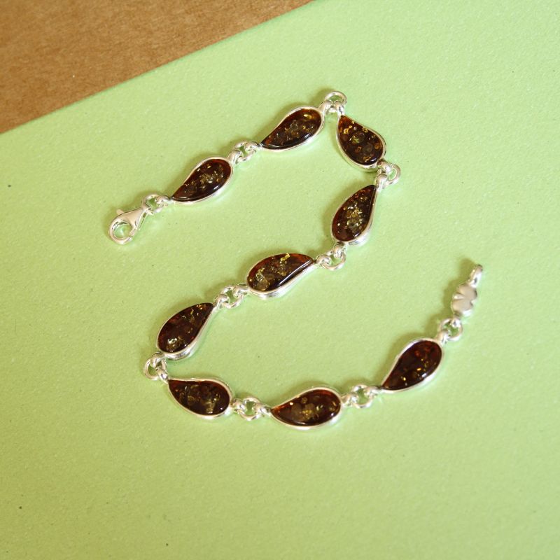 bracelet with swirls of cognac teardrop shape amber | Carathea