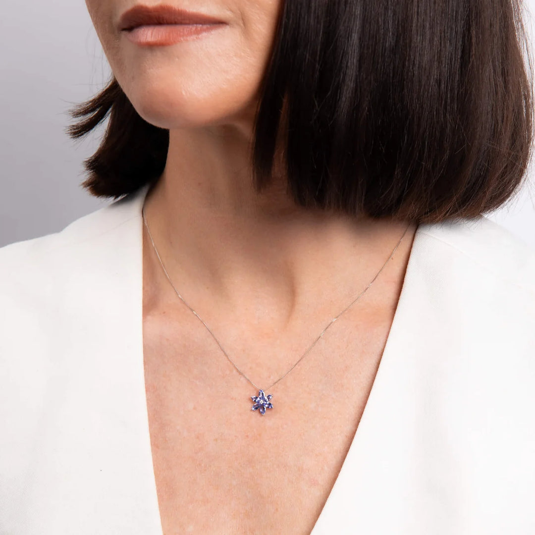 9ct White Gold Tanzanite and Diamond Flower Pendant Necklaces & Pendants Carathea & Jools, Bridgwater jewellers