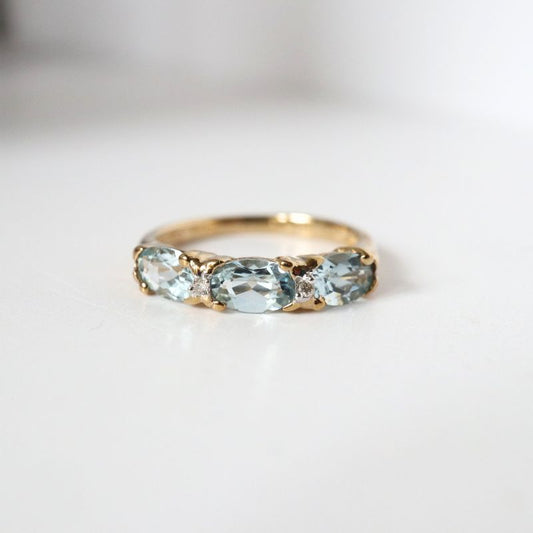 gold ring with aquamarine and diamond - Carathea jewellers