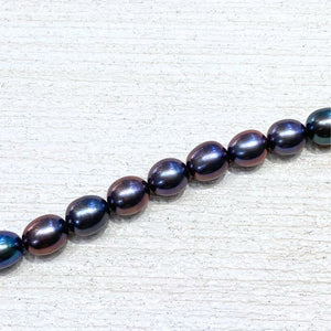 close up of black cultured pearl bracelet - Carathea jewellers