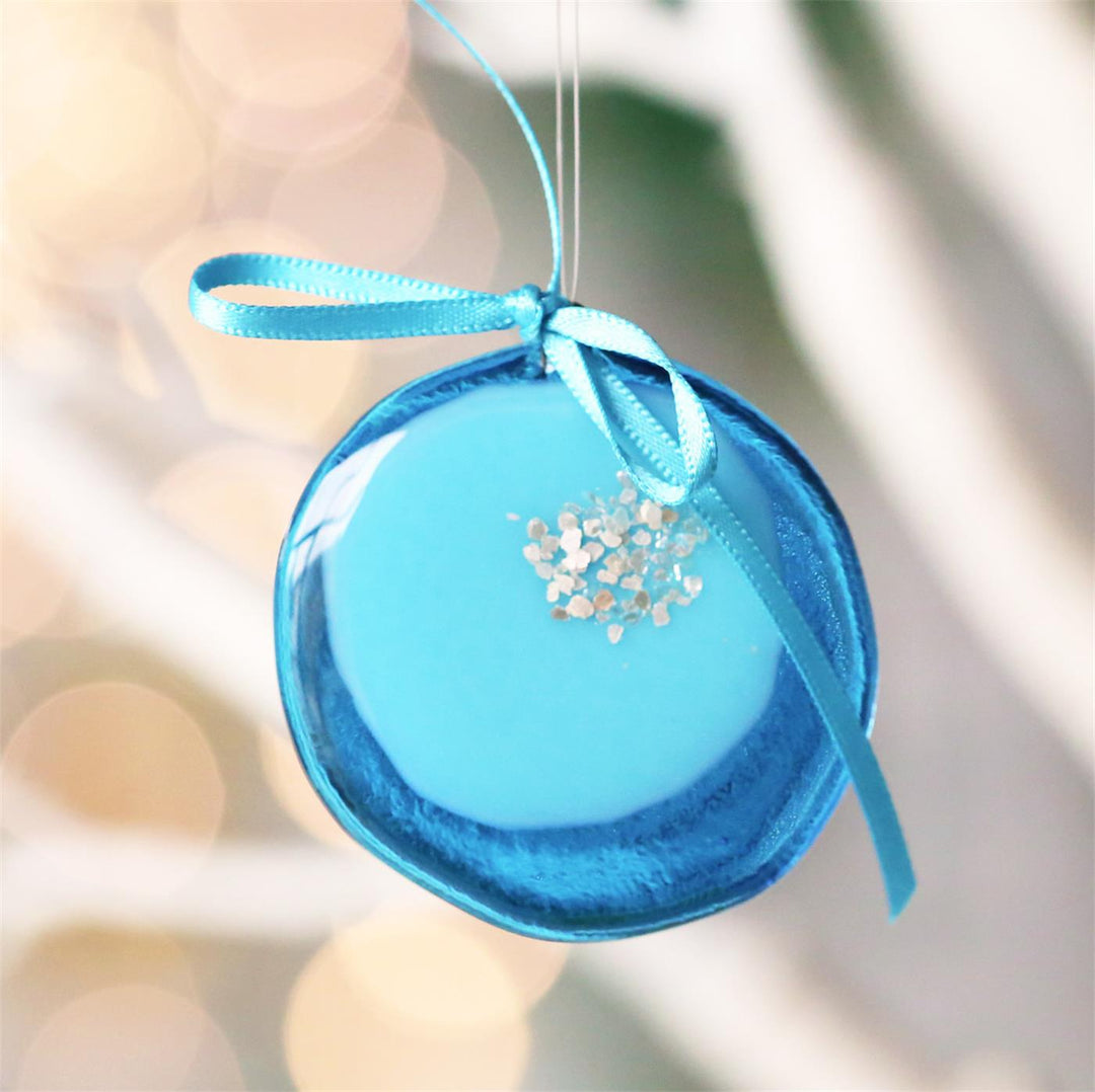Handmade fused glass Christmas bauble in red, green, or blue.