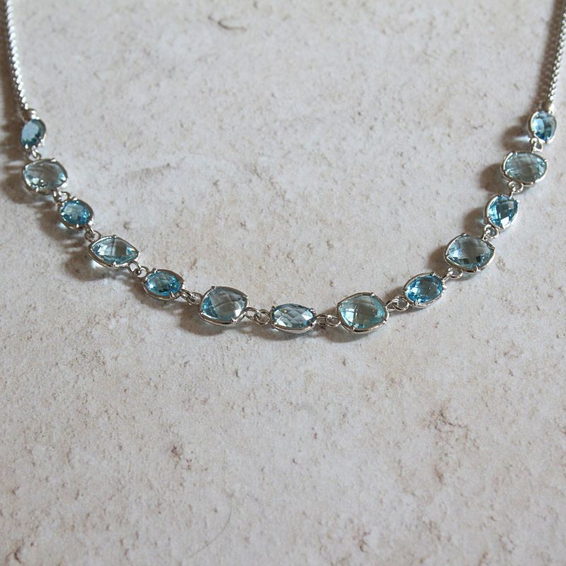 silver blue topaz necklace | Carathea.