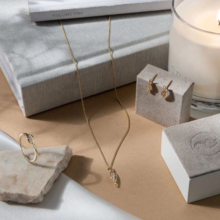 Gold and diamond Past Present Future pendant - Carathea