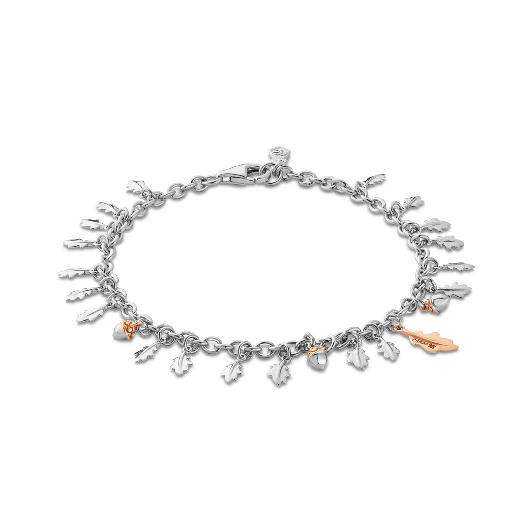 Silver and rose gold oak leaf bracelet with white topaz.