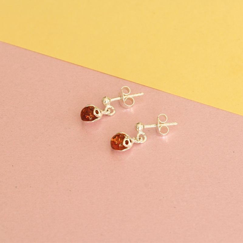 silver amber ladybird drop earrings | Carathea