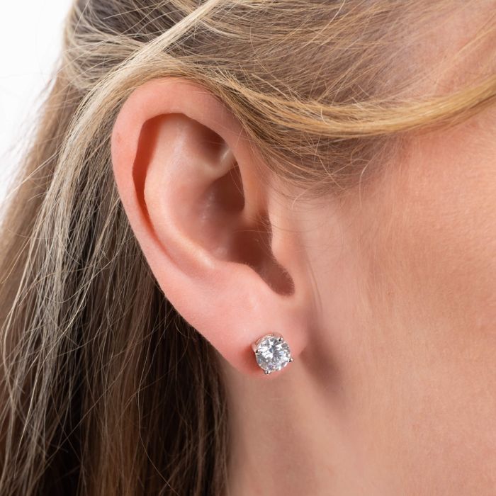 Solitaire stud earrings with cubic zirconia stones.