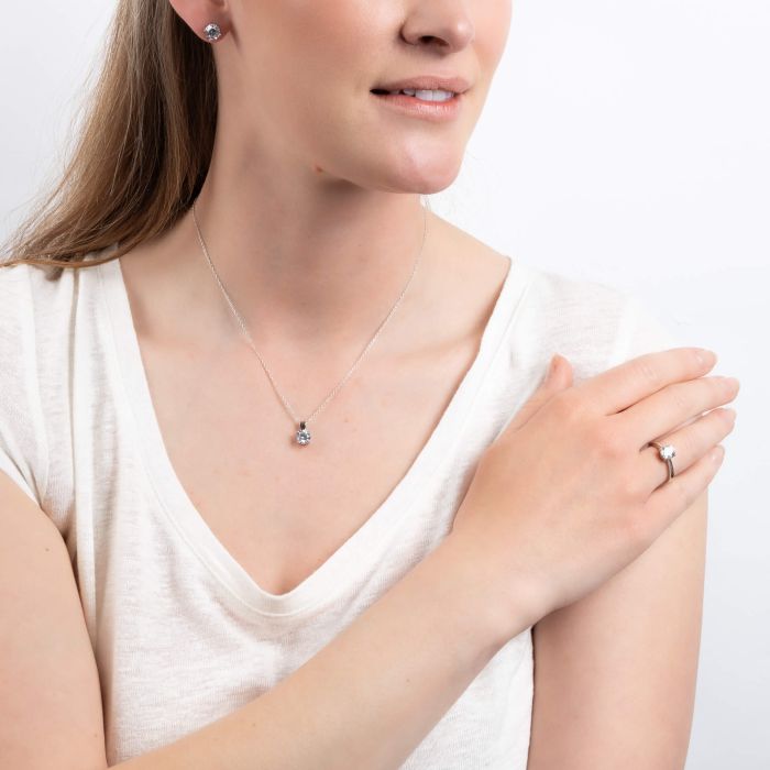 Solitaire stud earrings with cubic zirconia stones.