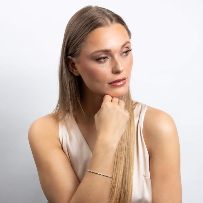 Diamonfire tennis bracelet with baguette-cut zirconia stones.