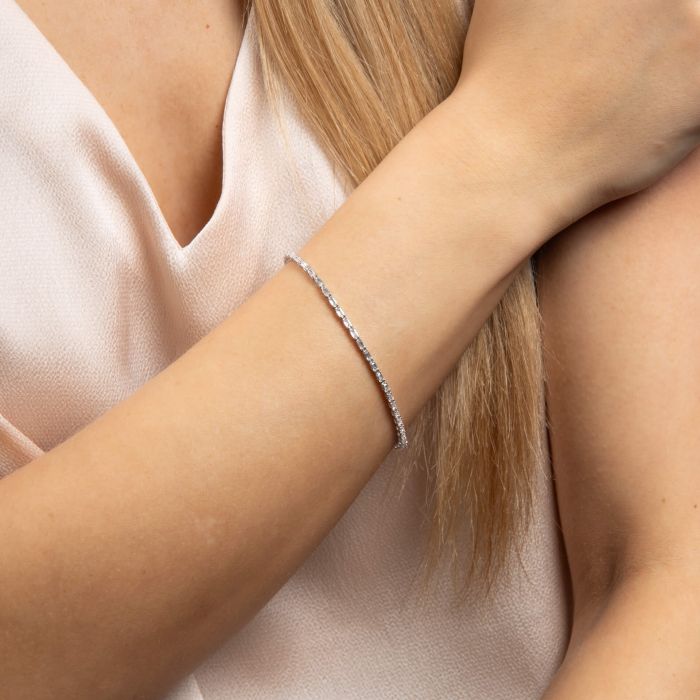 Diamonfire tennis bracelet with baguette-cut zirconia stones.