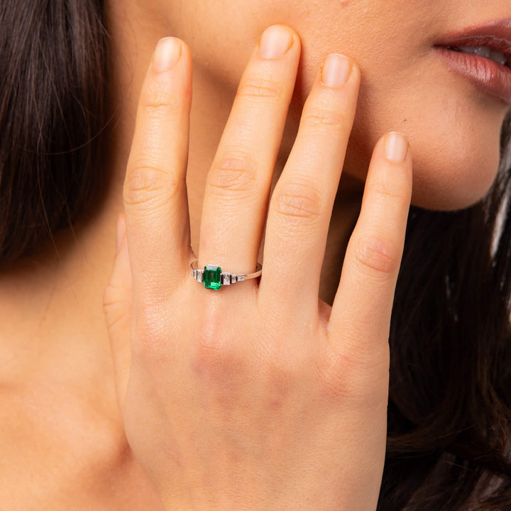 Ladies emerald-cut green and white silver and zirconia ring on model - Carathea & Jools