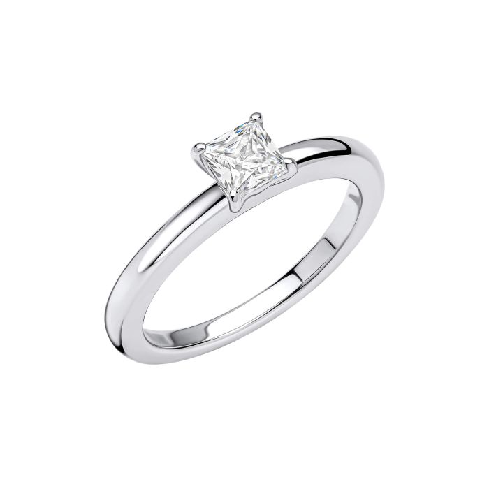 Princess cut solitaire ring with a silver band.