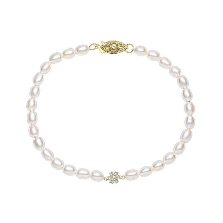 9ct yellow gold bracelet of small white seed pearls with a diamond-set gold flower, shown in full.