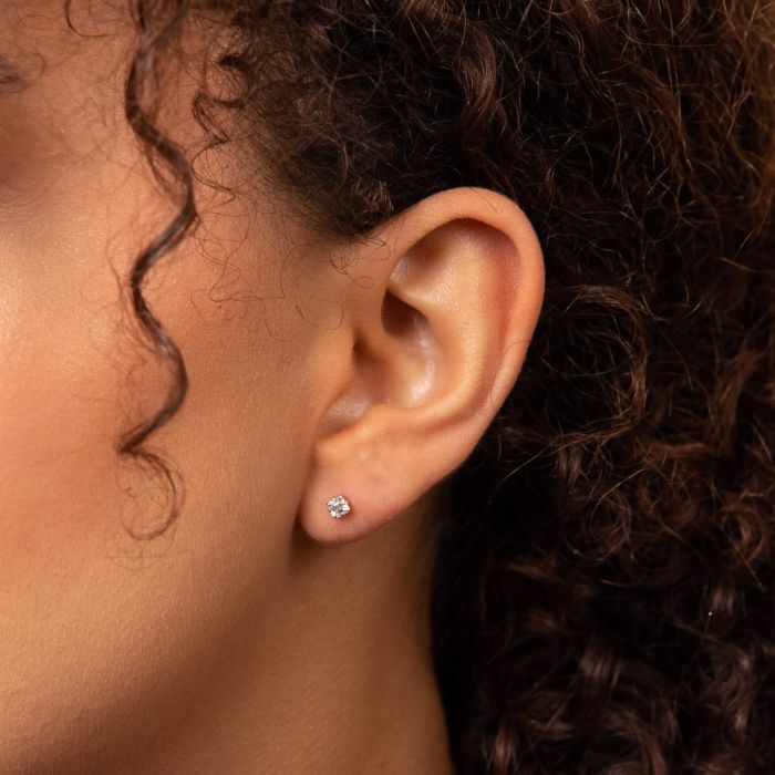 asscher cut diamond stud earrings on model